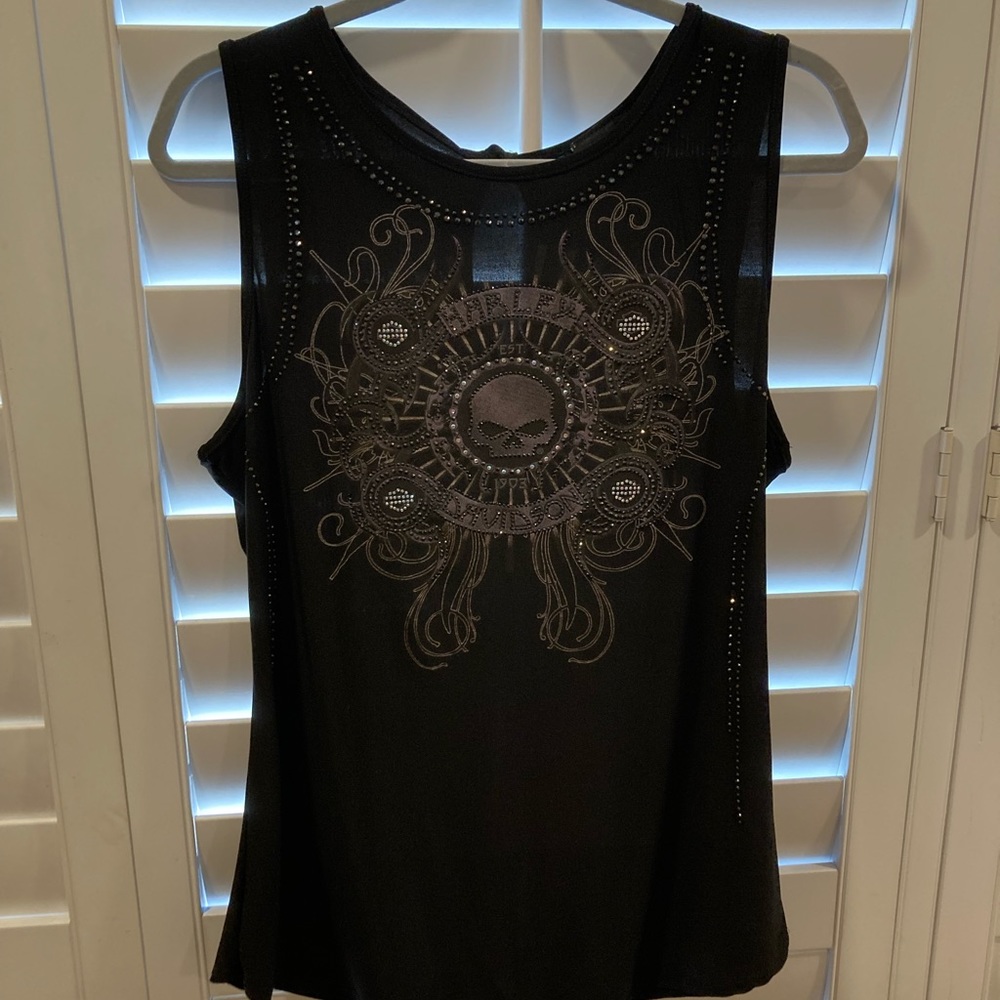 Harley Davidson sleeveless top.  Black stretchy material. Black with accents.